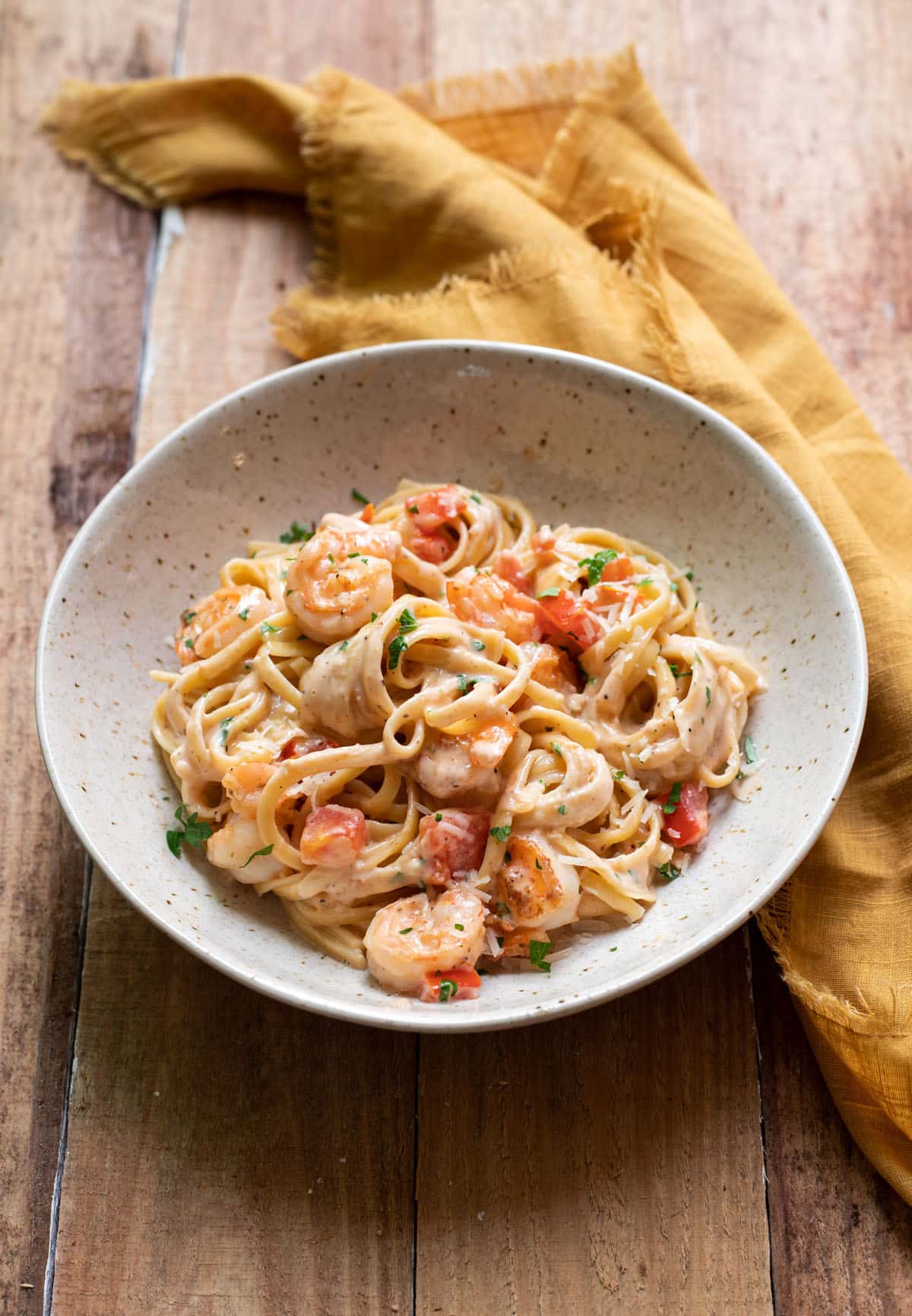 CREAMY CAJUN SHRIMP PASTA WITH TOMATOES