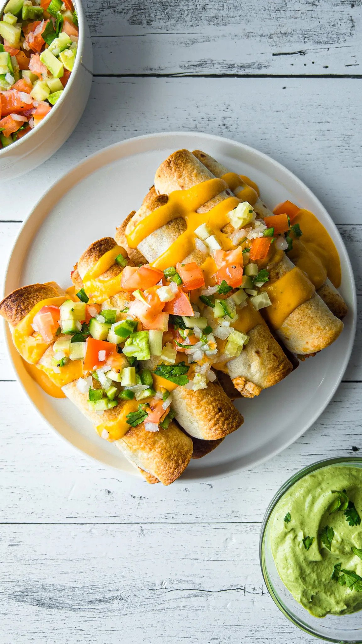 BAKED VEGAN TAQUITOS WITH AVOCADO CILANTRO LIME DIP